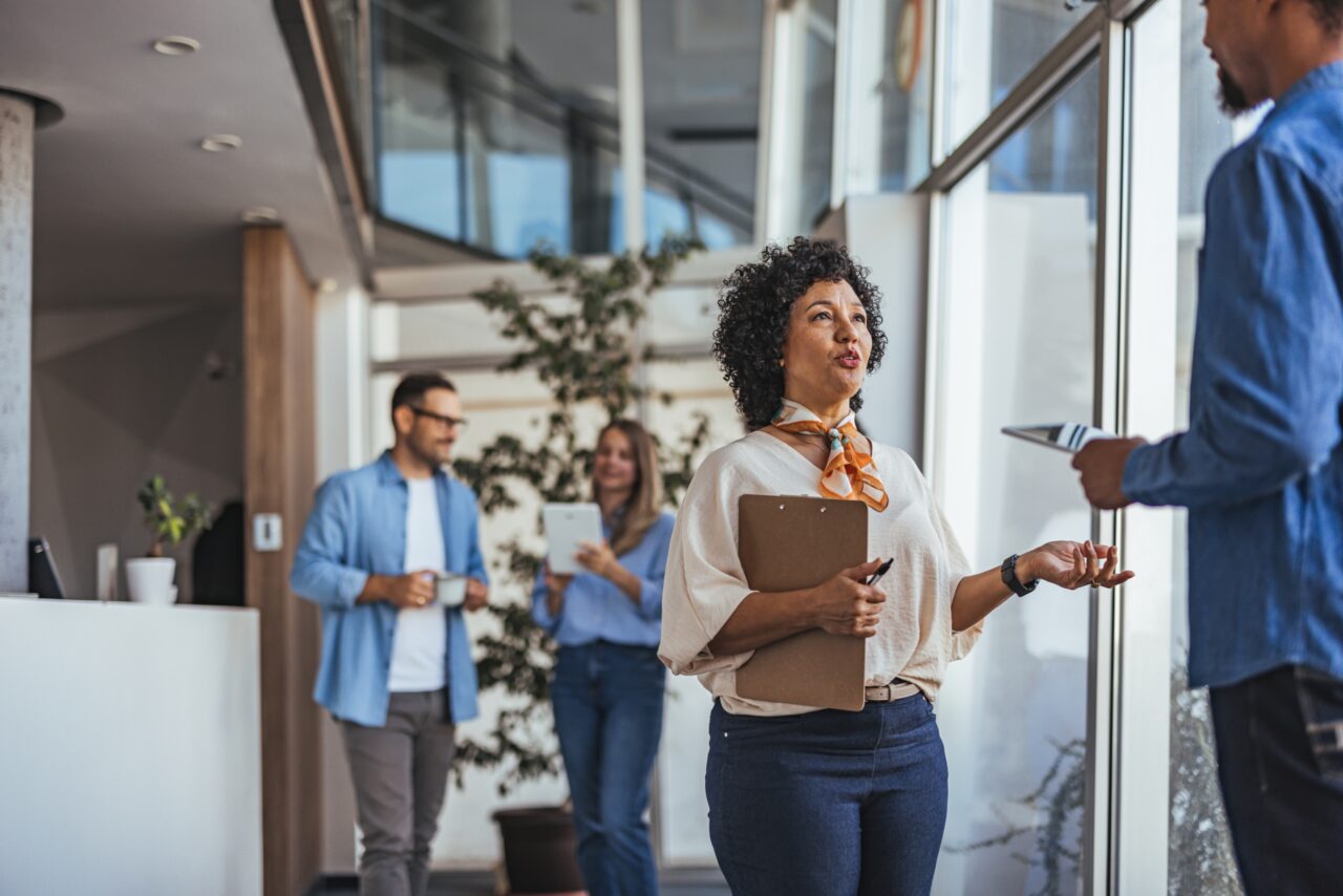 A,Group,Of,Diverse,Business,Colleagues,Engaging,And,Collaborating,In