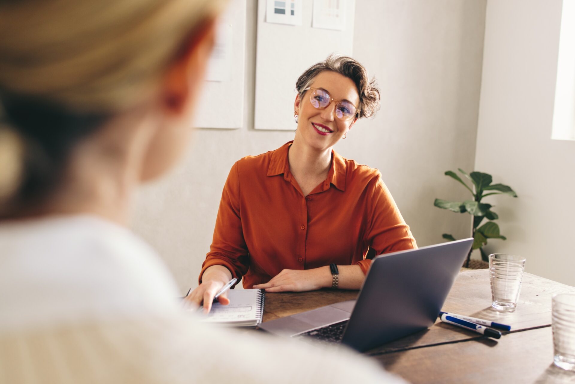 Happy,Hiring,Manager,Smiling,While,Interviewing,A,Job,Candidate,In