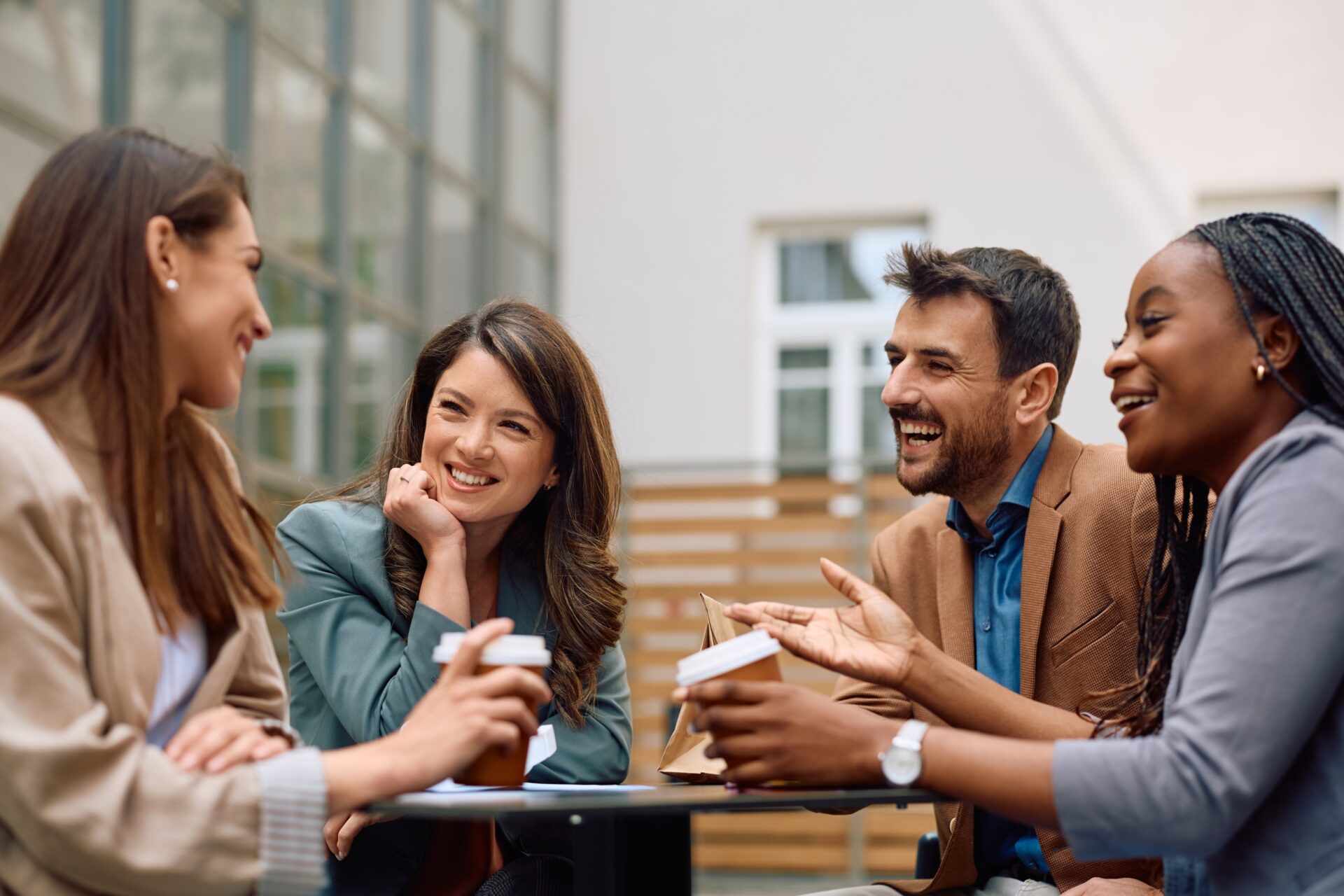 Happy,Creative,Colleagues,Having,Fun,While,Talking,And,Drinking,Coffee