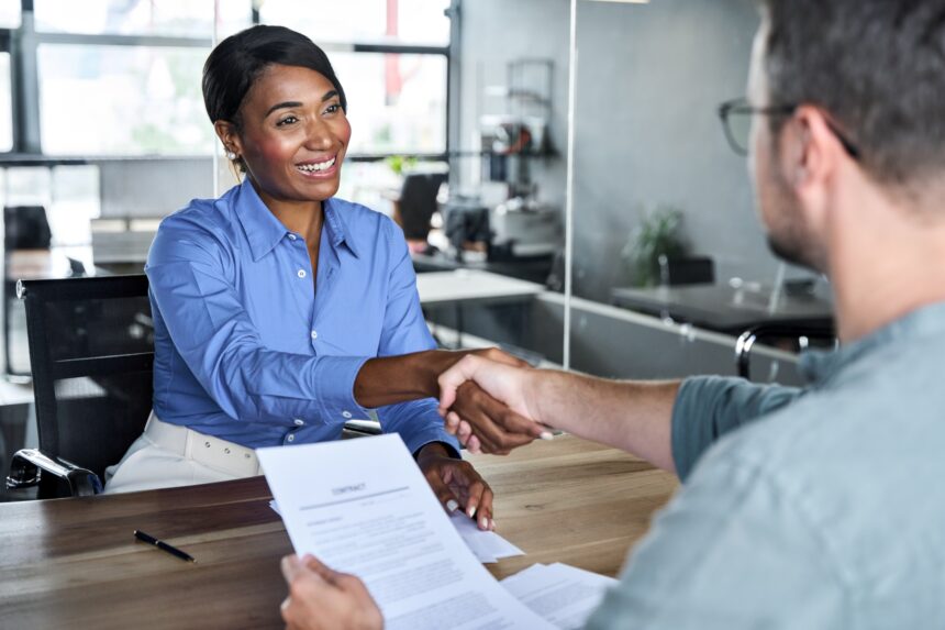 Happy,African,American,Business,Woman,Getting,Job,Handshaking,Bank,Manager