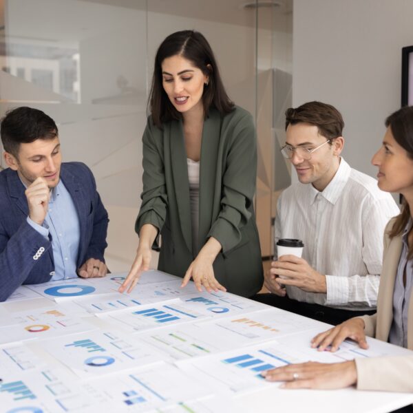 Young,Latin,Businesswoman,Presenting,Product,Sales,Analytic,Data,To,Team